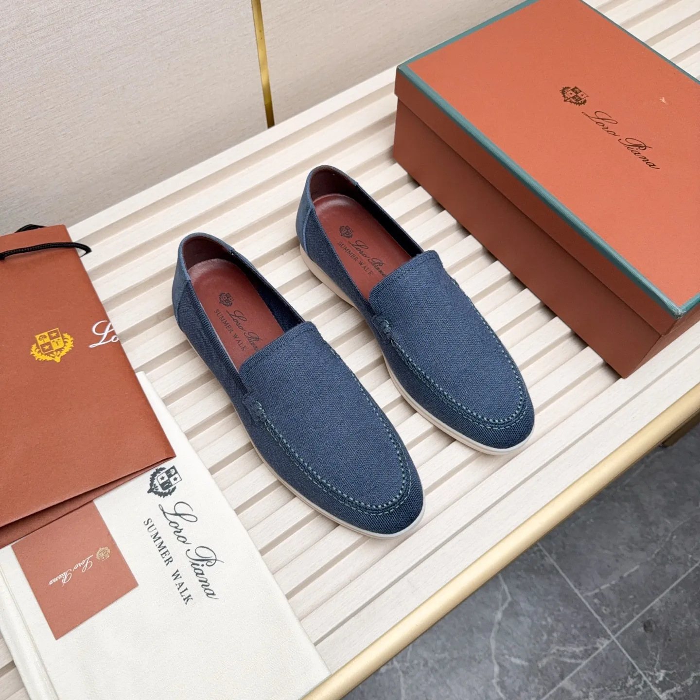 Men's Men's Shoes 💰400 Loro PIana moccasins are made of wish wool fabric. The upper is made of knitted fabric, made on a loom, and then attached to a rubber sole. The Rain System's water-repellent treatment enhances the shoe's functional design, while the suede details give the shoe a sense of elegance and sophistication. Made from Wish, fine wool from Australian and New Zealand Merino sheep
